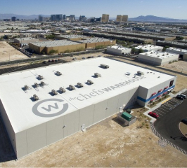 aerial view of a large flat roofed warehouse facility